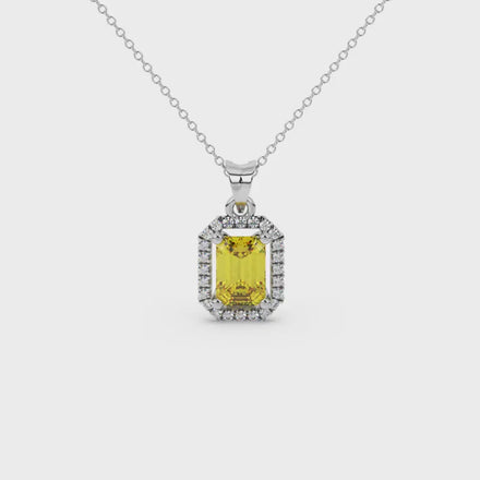 Emerald cut yellow gemstone halo pendant with round diamond accents