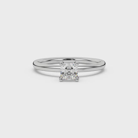 Asscher cut gemstone solitaire ring in gold with four-prong setting