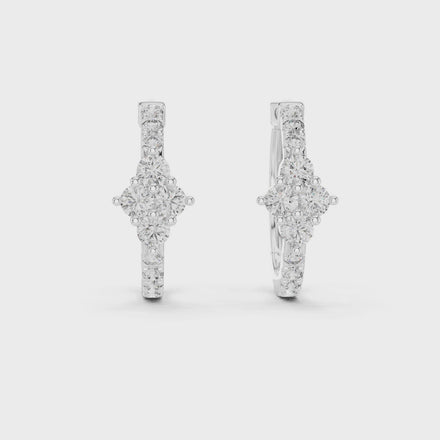 Diamond cluster hoop earrings with floral inspired design