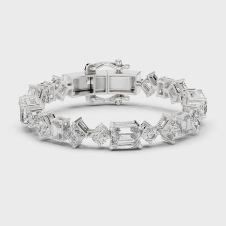 Luxury mixed shape diamond tennis bracelet in gold with emerald, princess, and round lab grown diamonds by Signora Jewels