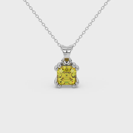 Yellow Asscher cut gemstone pendant in gold featuring a crown-inspired eight-prong solitaire setting