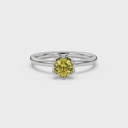 Yellow cushion cut floral solitaire ring in rose gold with six prong flower setting