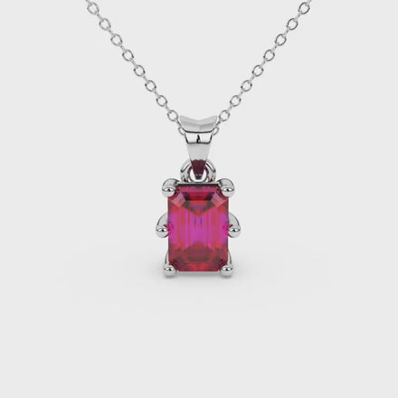 Emerald cut red gemstone solitaire pendant in gold with six prong setting