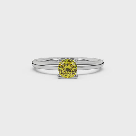 Yellow cushion cut solitaire gemstone ring in rose gold with classic four prong setting