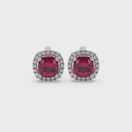 Red cushion cut gemstone stud earrings with double diamond halo in gold
