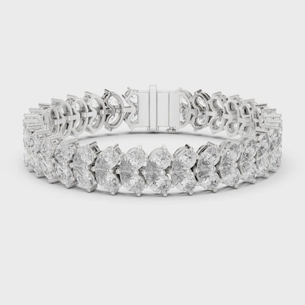 Luxury pear shape diamond tennis bracelet in gold with brilliant lab grown diamonds by Signora Jewels