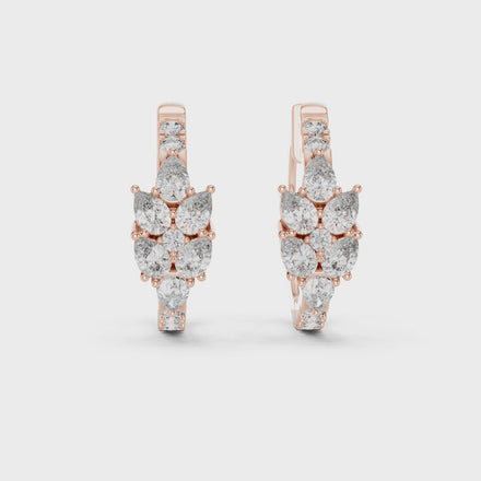 Pear diamond huggie hoop earrings in gold with round and pear shaped CVD diamonds by Signora Jewels