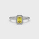 Yellow emerald cut gemstone halo ring with split shank band and diamond accents