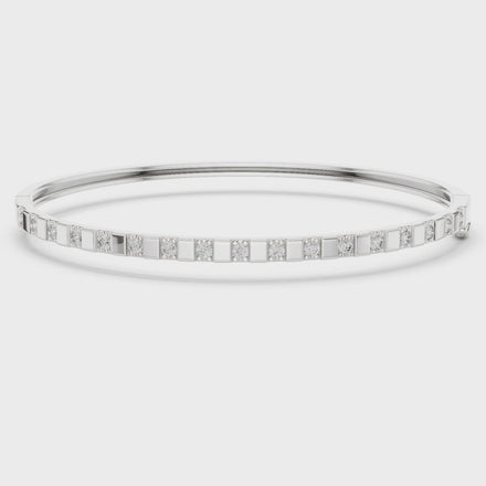 Minimal round diamond bangle bracelet in gold with delicate lab grown diamonds by Signora Jewels