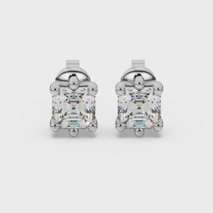 Asscher cut gemstone stud earrings in gold with six-prong basket setting and screw-back closure