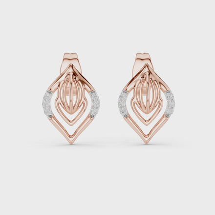 Diamond leaf stud earrings in gold with pavé diamonds