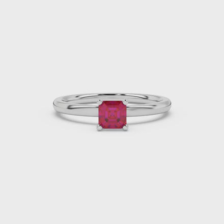 Red Asscher cut solitaire ring in gold featuring a 5.00 MM gemstone in a classic four-prong cathedral setting