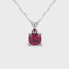 Red cushion cut gemstone solitaire pendant in gold featuring a refined four-prong basket setting
