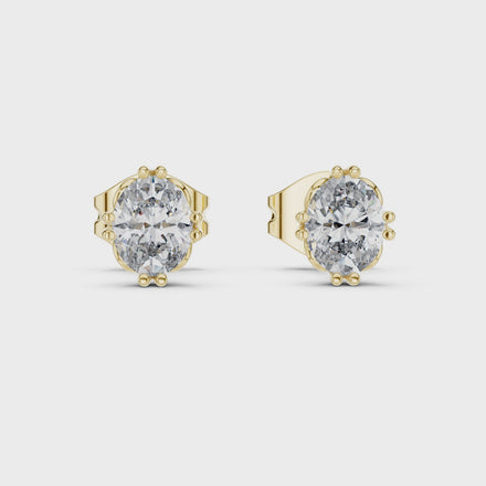 Oval cut solitaire diamond stud earrings in gold with lab grown diamonds by Signora Jewels