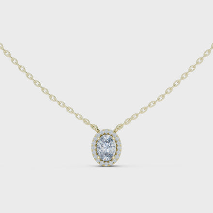 Minimal oval halo diamond pendant in gold with lab grown diamonds by Signora Jewels