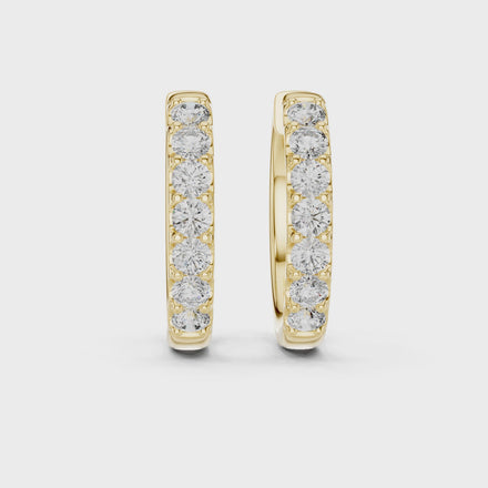 Diamond huggie hoop earrings with round diamonds in U-cut setting