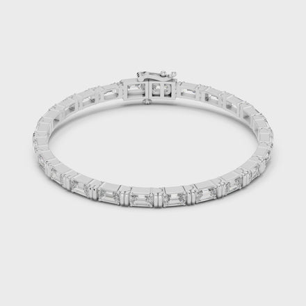 Emerald cut lab grown diamond tennis bracelet in yellow gold white gold and rose gold with sleek modern diamond layout