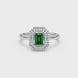 Emerald cut green gemstone double halo ring with octagonal diamond frame in gold