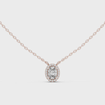Minimal oval halo diamond pendant in gold with lab grown diamonds by Signora Jewels