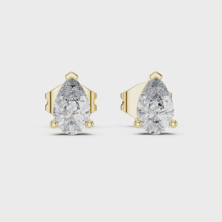 Pear cut solitaire diamond stud earrings in gold with lab grown diamonds