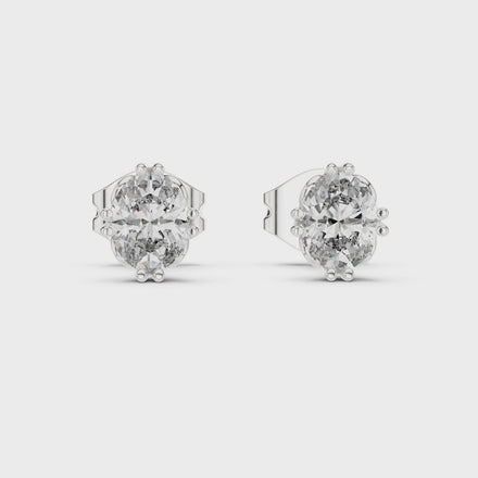 Oval cut solitaire diamond stud earrings in gold with lab grown diamonds by Signora Jewels