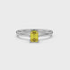 Emerald cut yellow gemstone solitaire ring in six prong gold setting