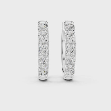 Diamond huggie hoop earrings with round diamonds in U-cut setting