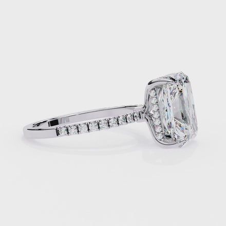 Radiant cut lab grown diamond engagement ring with hidden halo, cathedral setting and pavé diamond band