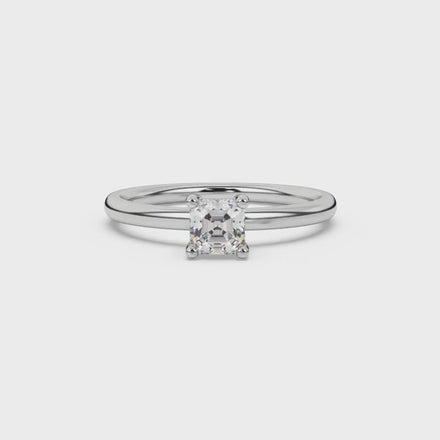Asscher cut gemstone solitaire ring in gold with four-prong setting