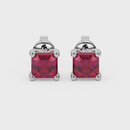 Asscher cut gemstone stud earrings in gold with four-prong basket setting and screw-back closure