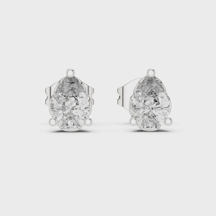 Pear cut solitaire diamond stud earrings in gold with lab grown diamonds
