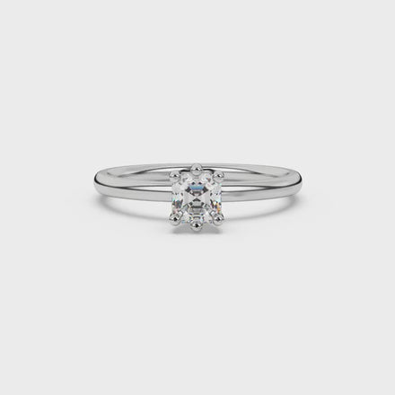 Asscher cut gemstone solitaire ring in gold with secure six-prong setting