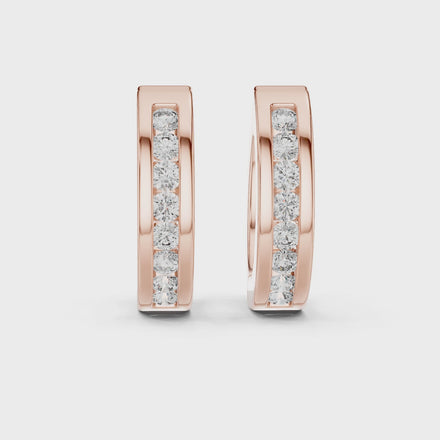 Gold diamond huggie hoop earrings for women