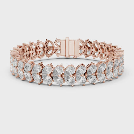 Luxury pear shape diamond tennis bracelet in gold with brilliant lab grown diamonds by Signora Jewels