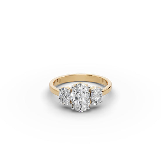 Oval Lab Grown Diamond Trio Engagement Ring in yellow gold, front view